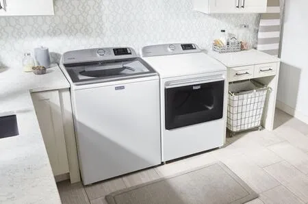 Maytag 5.4 cu. ft. Smart Top Load Washer with 7.4 cu. ft. Smart Electric Dryer in White